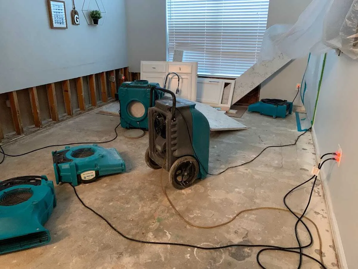 Dehumidifier in flood-cut room for Water Damage Restoration in Delafield